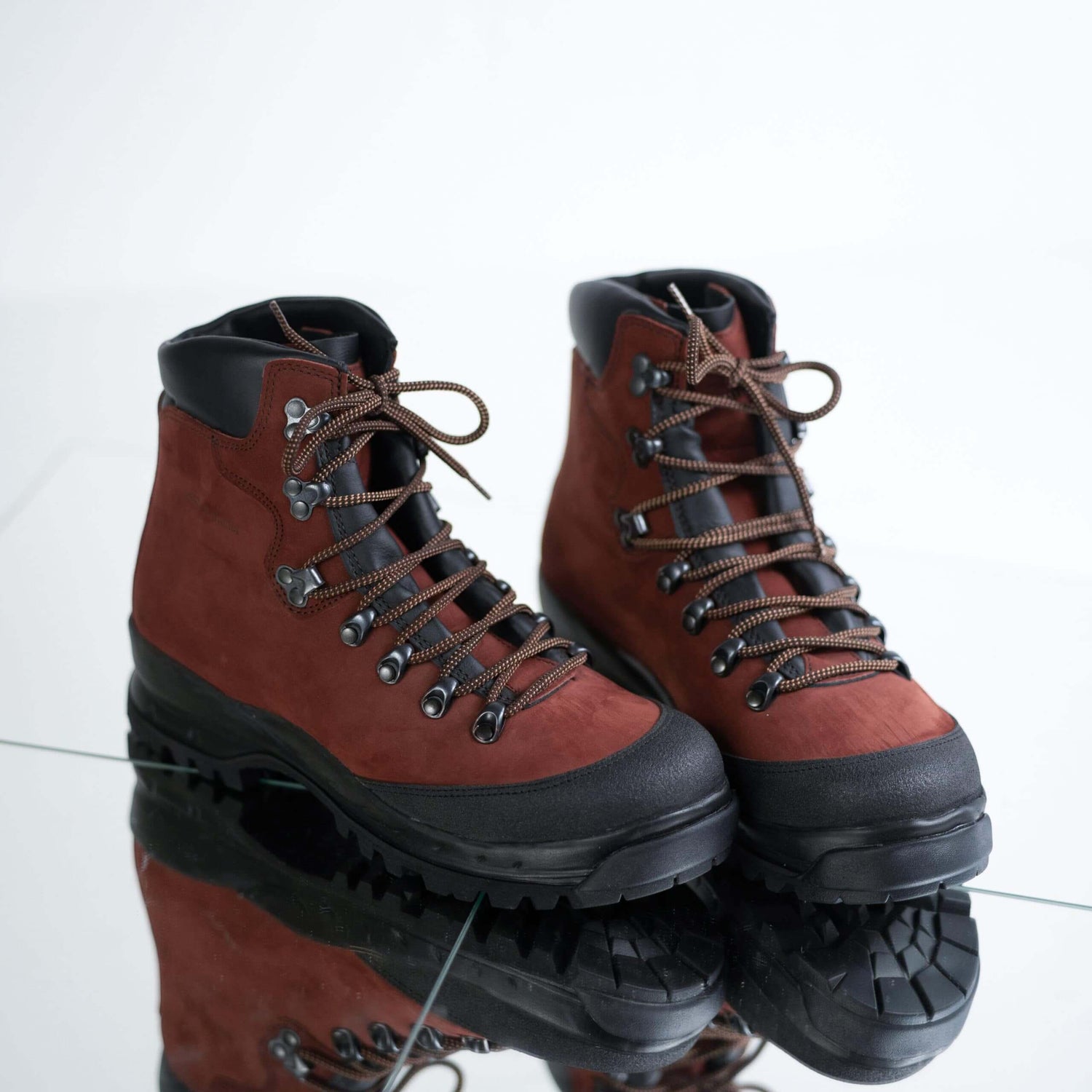 High quality red hiking boots from Samelin, made in Estonia, designed to meet NATO standards.
