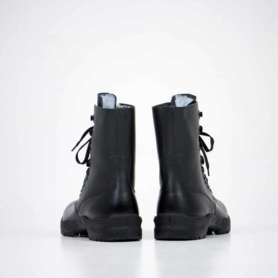 Rear view of M77 Norwegian Combat Boots 2.0 showcasing sturdy black leather design and dual-layer sole.