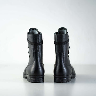 Back view of M77 Norwegian combat boots highlighting their durable design and military style.